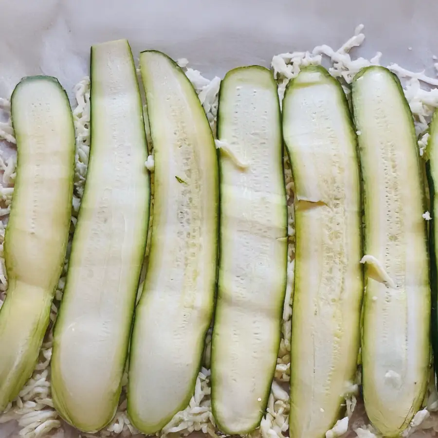 Flat lay of fresh ingredients for zucchini breadwich