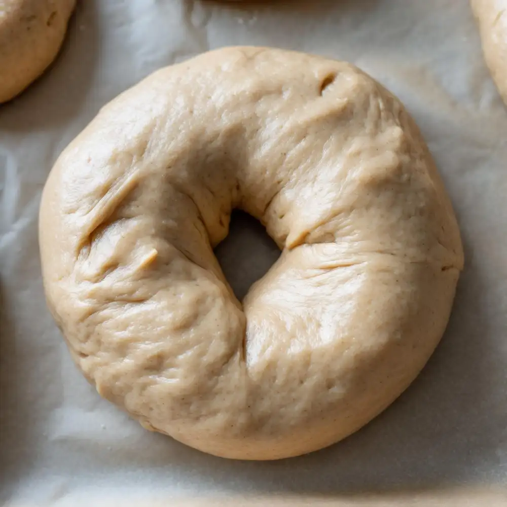 Shaped keto bagel dough before baking