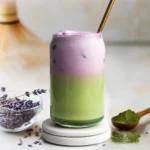 Iced lavender matcha latte with foam