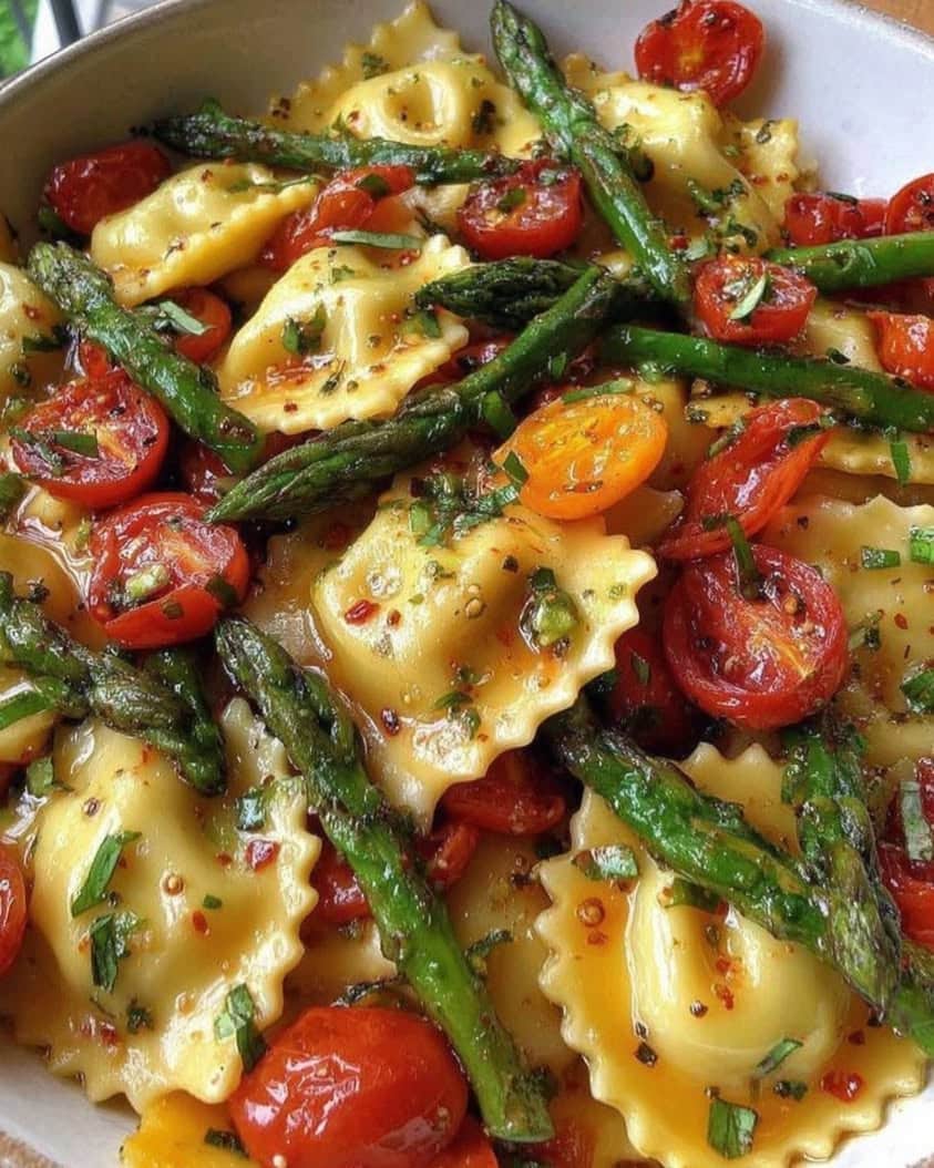 ravioli tomatoes asparagus garlic herbs